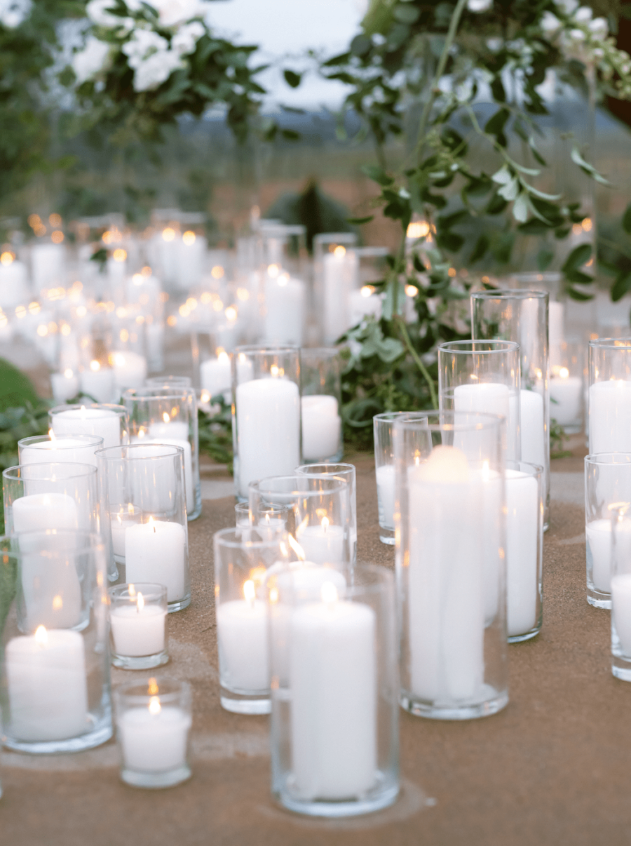 heavy candle light candle aisle way all white candles