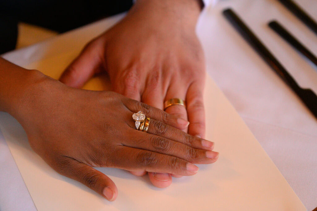 Bride and Groom in Sedona Elope photo of their wedding bands