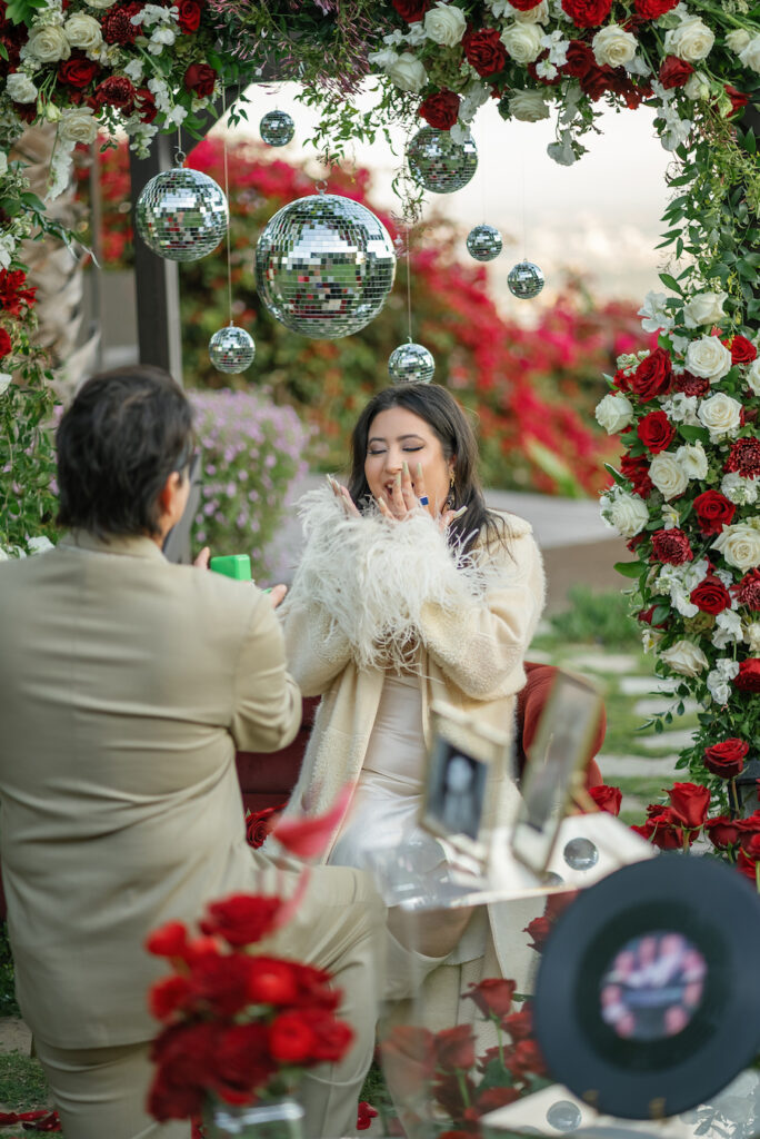 She said "YES!" at the Hollywood Hills proposal when he asked her to marry him.