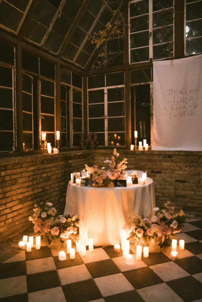Candle lit table with florals and decor for a proposal