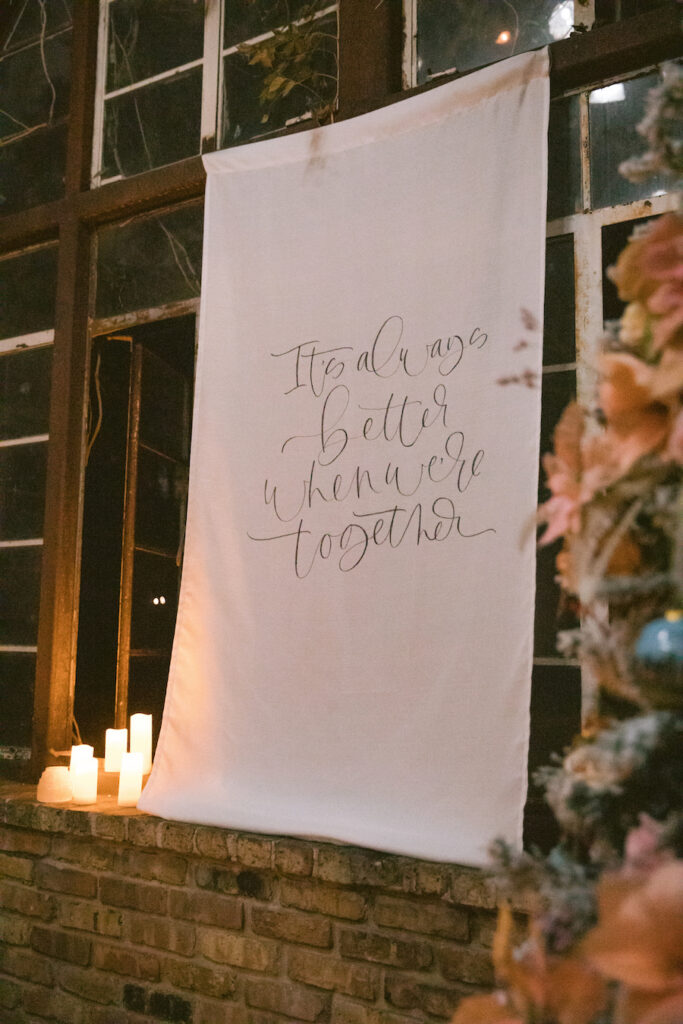 Fabric banner for proposal with lyric "It's Always Better When We're Together"