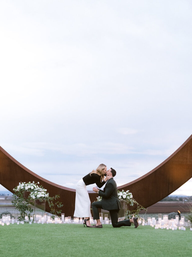 Fiancee's exchanging a kiss at their proposal