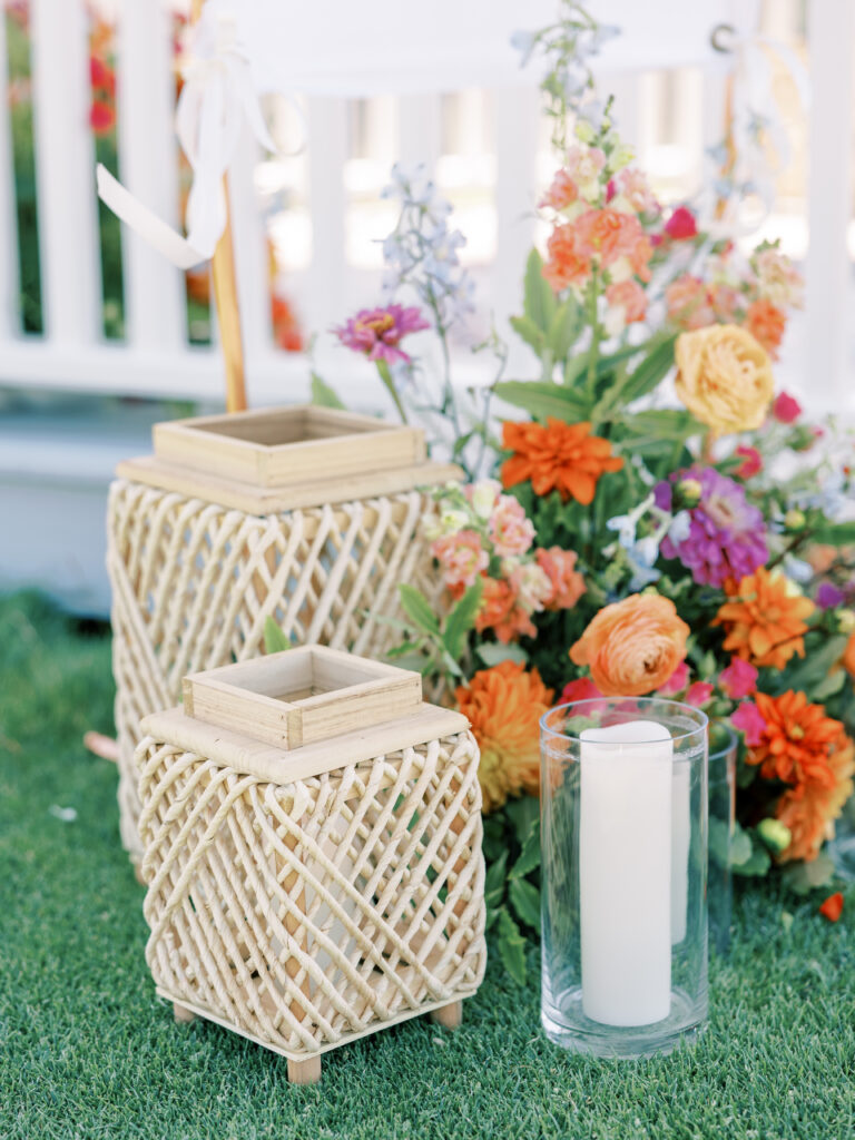 Woven lanterns, candles and colorful blooms at the proposal