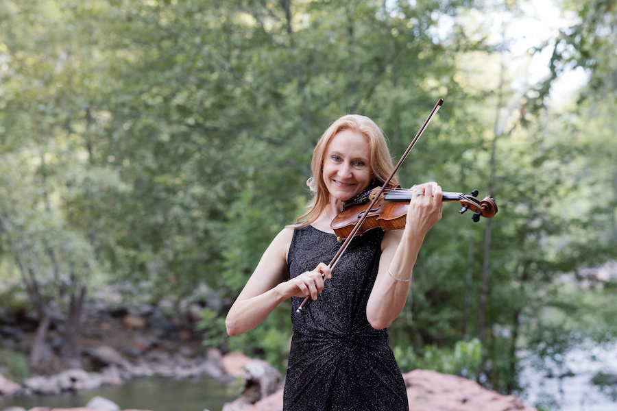 Live violinist playing during the proposal