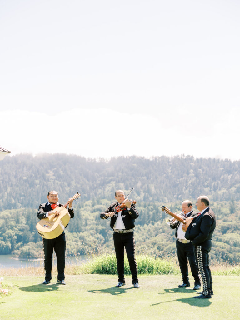 Mariachi band serenading the couple on the lawn