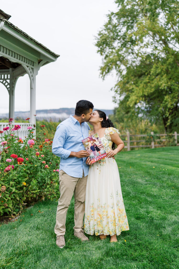 Couple kissing in the garden after the Napa proposal