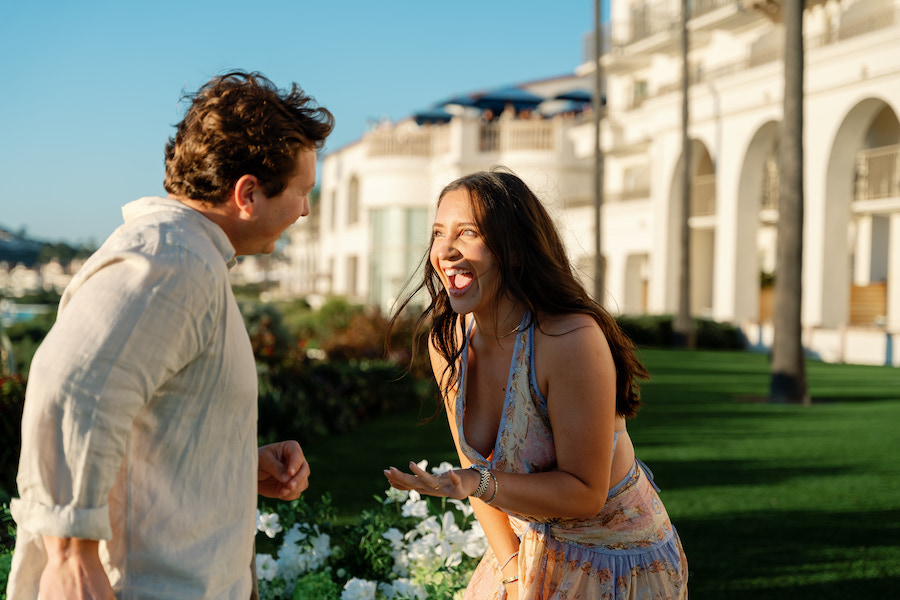 Nicole laughing with joy in front of The Ritz-Carlton, Laguna Niguel
